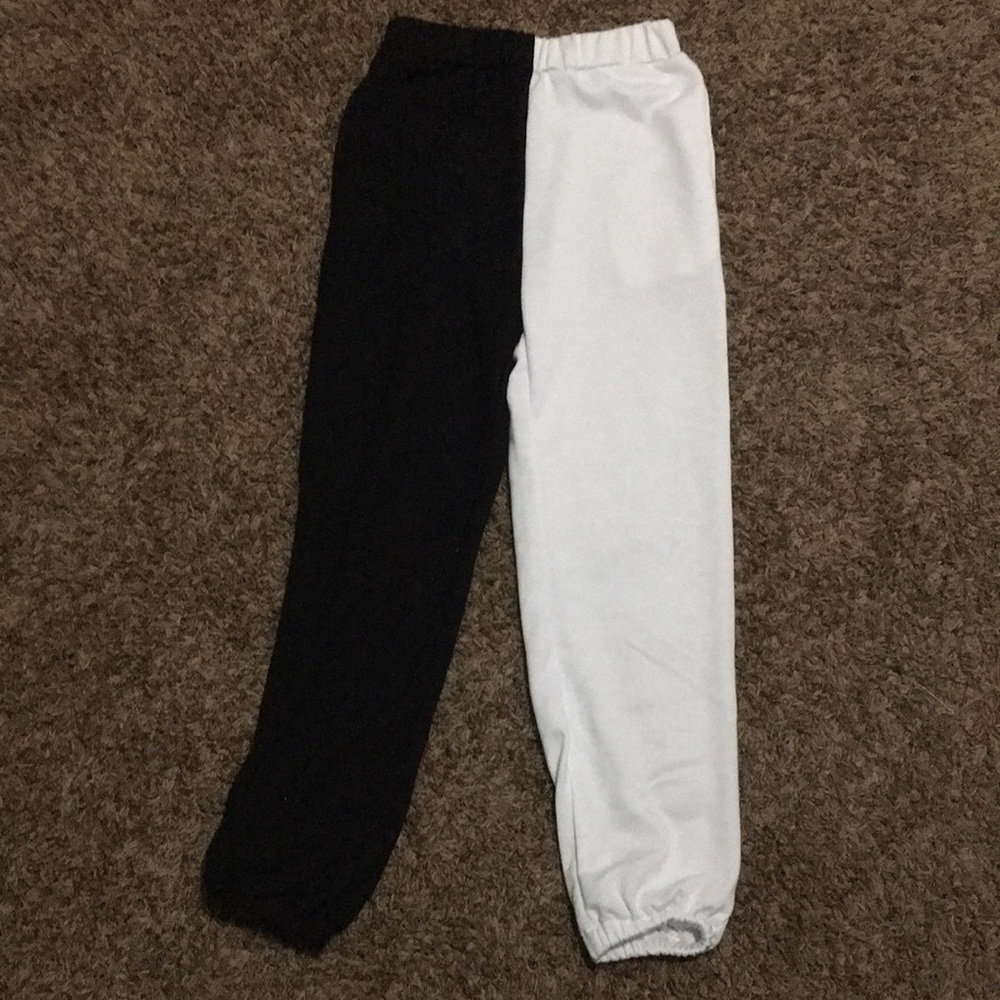 Half white half black joggers